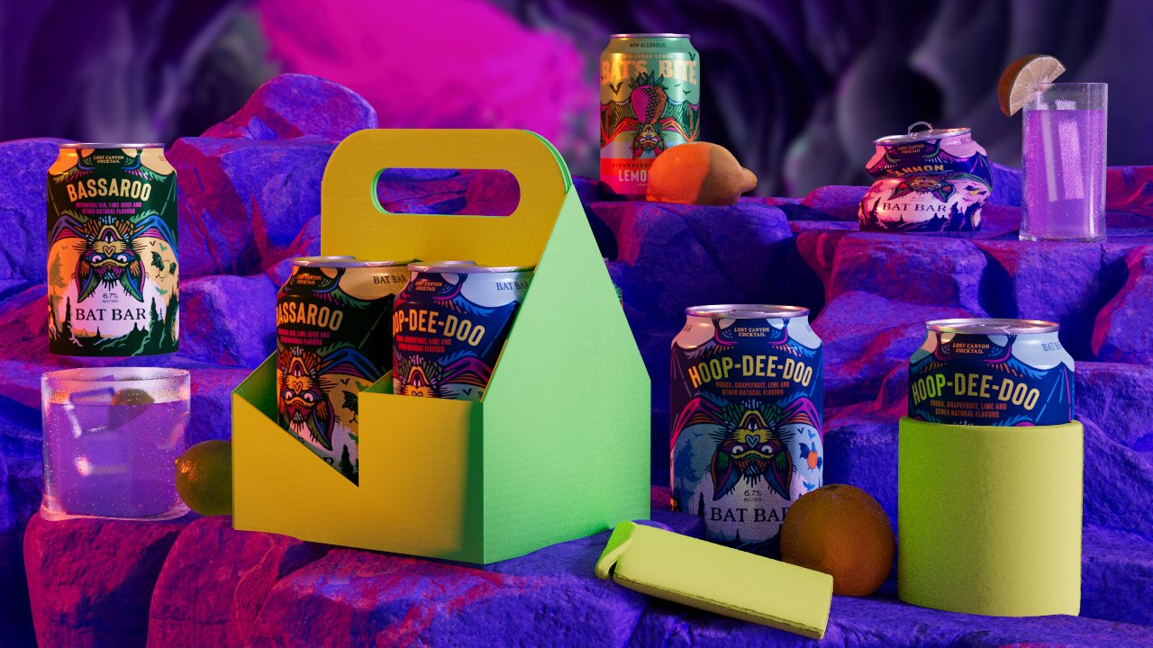 Bat Bar cans, a yellow four-pack carrier, a koozie, a glass and fruit on purple cave rock.