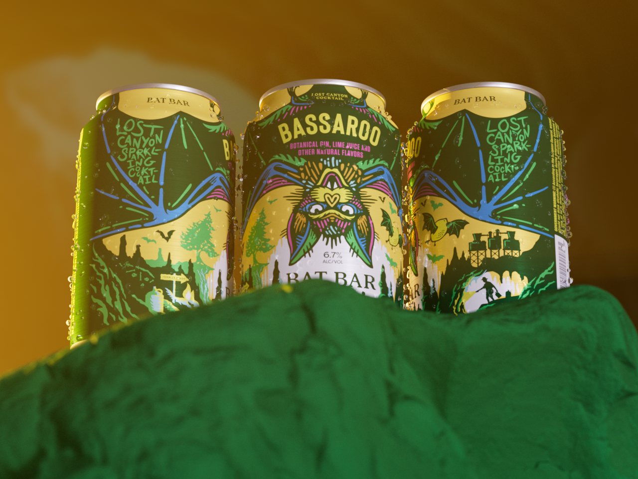 Three Bassaroo cans with condensation on a mossy green rock in an amber-lit cave.