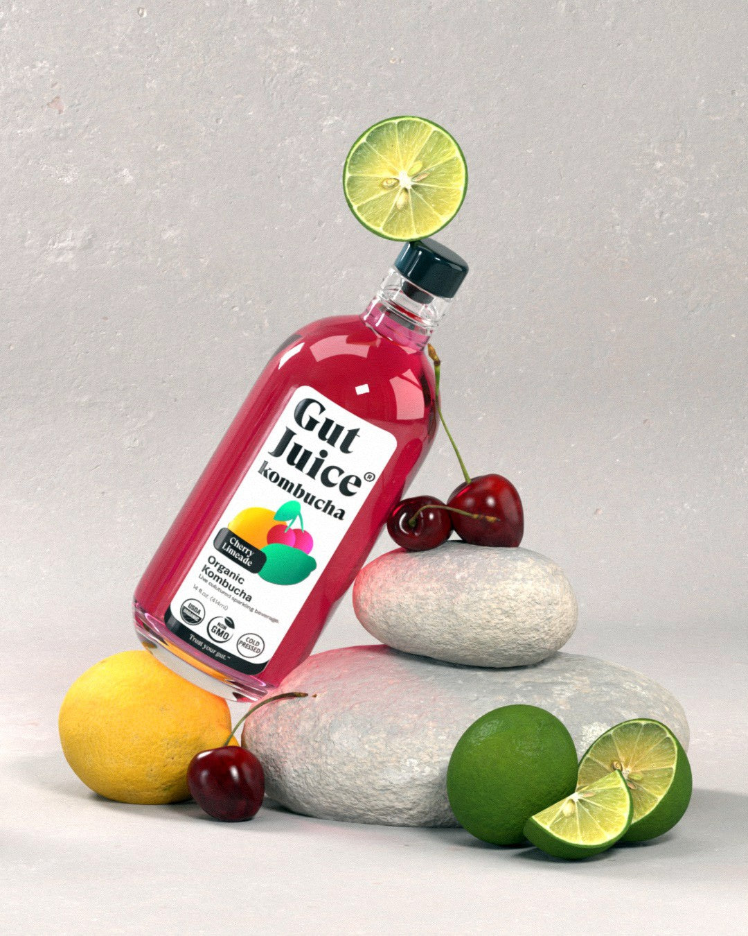 Gut Juice kombucha product render with lime, cherries and sculpted stones