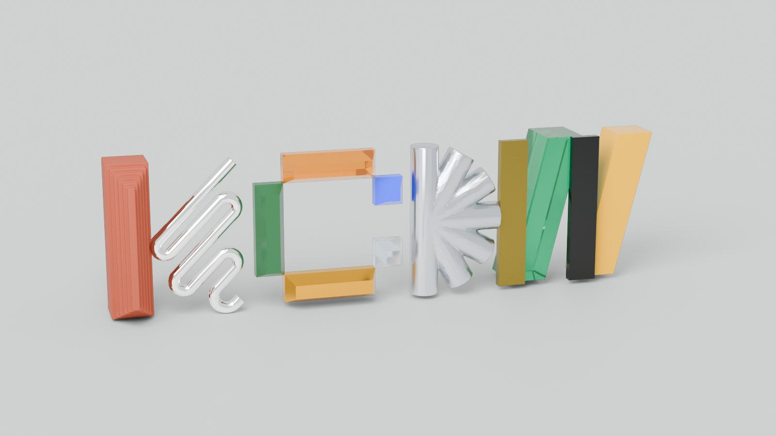 The 3D KCDW wordmark: twelve pieces in brick, chrome, clover, candy glass, gold, plastic, clear glass, foil, brass and black gloss assembling