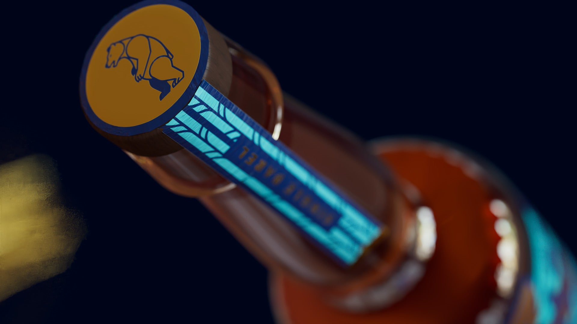Looking down at the bourbon cap: a gold disc with the bear in navy line art