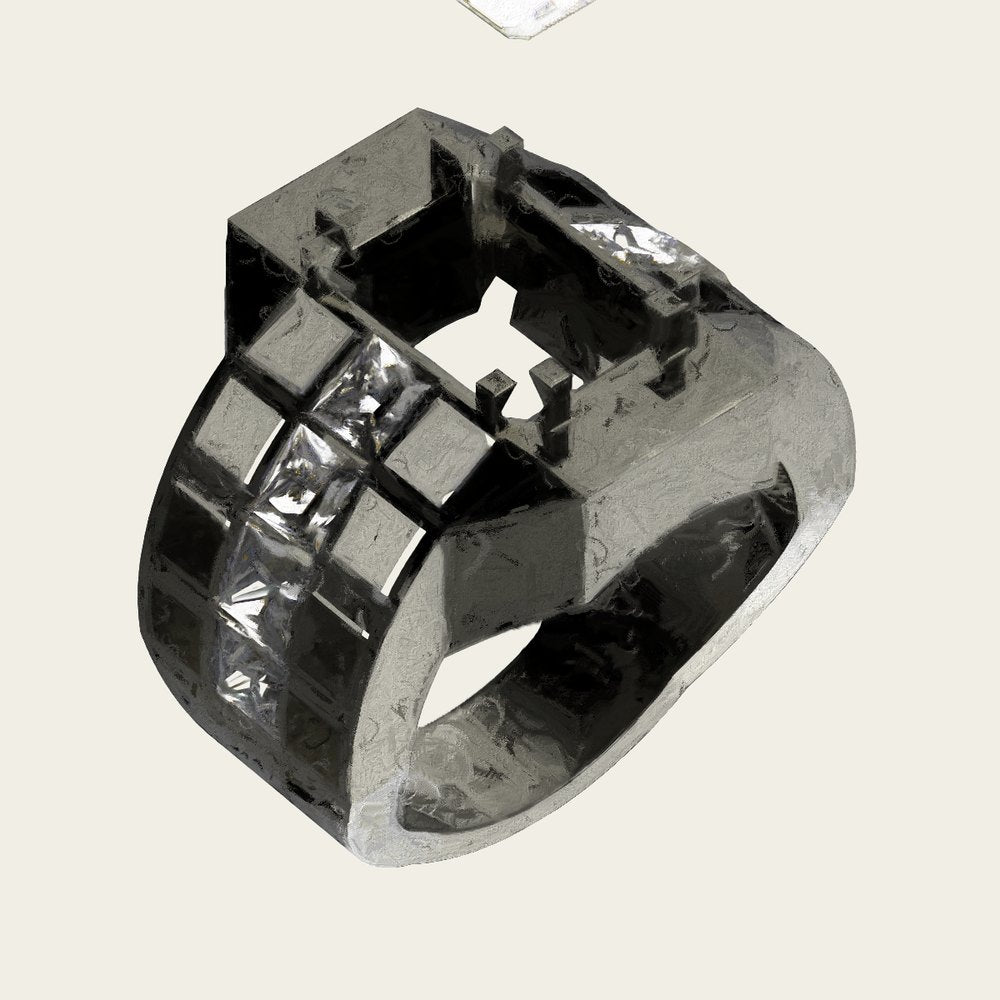 A painterly version of the ring in dark raw metal with the stone channel filling.